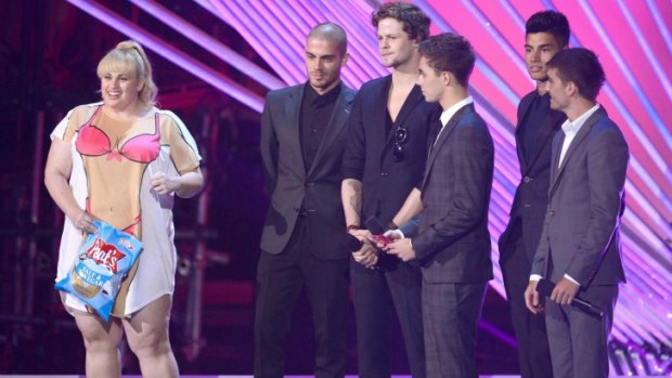 Rebel Wilson in her comedic element with The Wanted on stage at the 2012 MTV Video Music Awards.