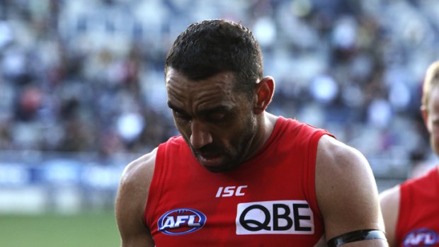 Swans captain Adam Goodes sheds a tear as he walks off the ground after his team's win over the Cats.