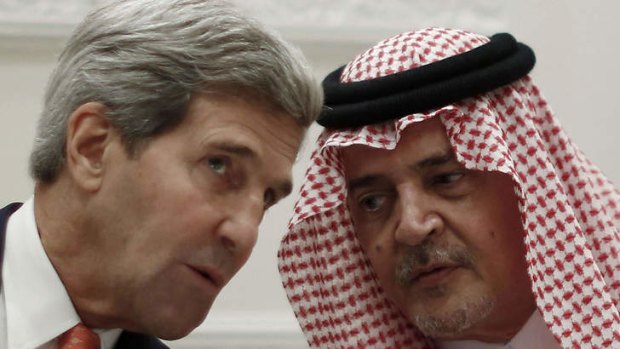 US Secretary of State John Kerry and Saudi Foreign Minister Prince Saud al-Faisal talk during a joint press conference in Riyadh.