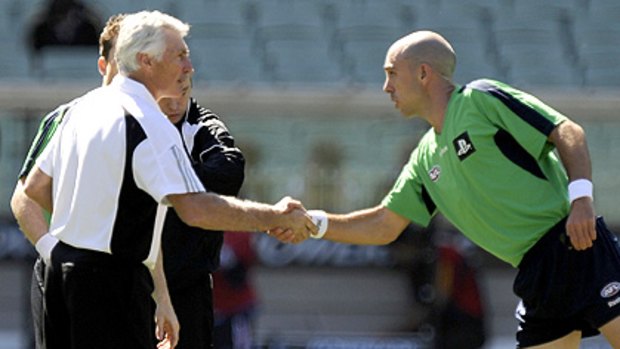 Collingwood coach Mick Malthouse has suggested senior coaches and umpires should shake hands on the ground before games.