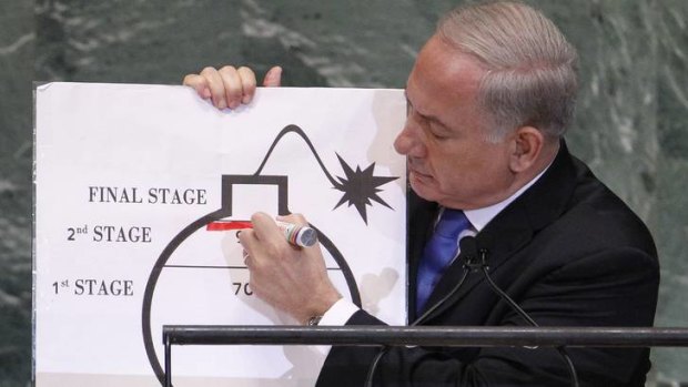A prop to underline the point ... Israeli Prime Minister Benjamin Netanyahu draws a red line on a graphic of a bomb as he addresses the 67th United Nations General Assembly.