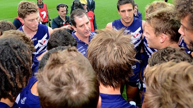 Tight group. Ross Lyon speaks to Fremantle players after their stunning win over Geelong at Simonds Stadium.