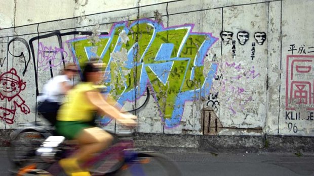 Graffiti streets makes Berlin a great city to explore on bicycles.