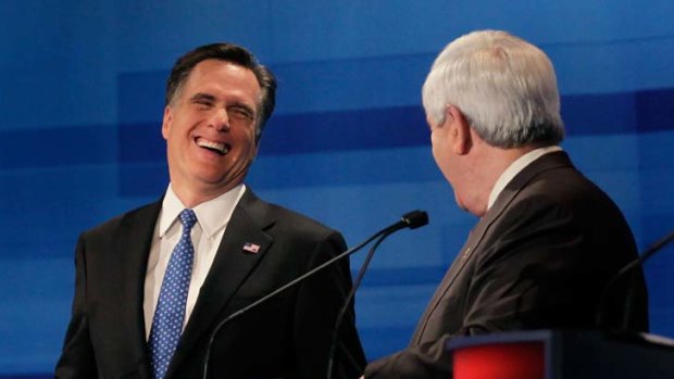 A lighter note &#8230; Mitt Romney, left, and Newt Gingrich share a laugh.
