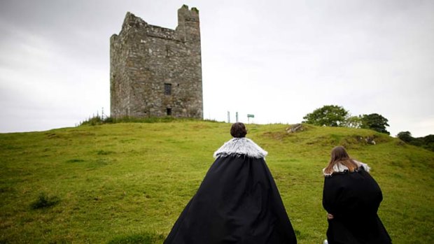 <em>Game of Thrones</em> tourists visit Audleys field and castle, Castle Ward, Strangford Lough in Northern Ireland. Audleys field and castle was used for filming King Robert Baratheon and his retinue arrive at Winterfell in season one.