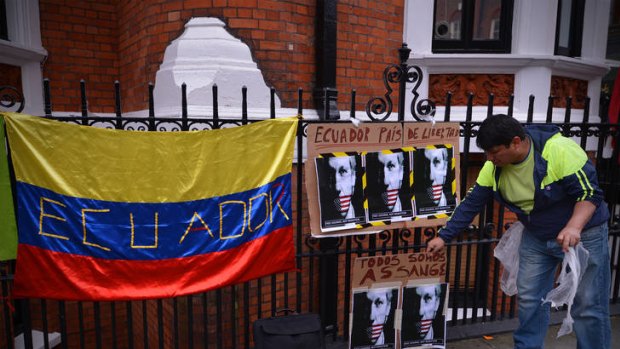 A supporter of WikiLeaks founder Julian Assange outside the Ecuadorian embassy in central London this week.