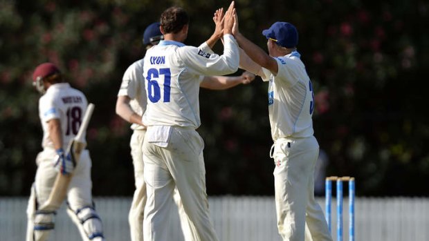 Nathan Lyon celebrates taking Chris Hartley's wicket at Allan Border Field.