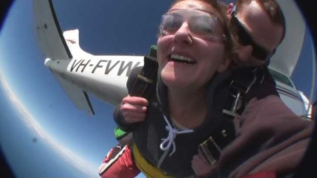 There she goes ... no signs of flappy face here as <i>smh.com.au</i> reporter Stephanie Gardiner overcomes her worst fear and leaps from a plane at 14,000 feet.