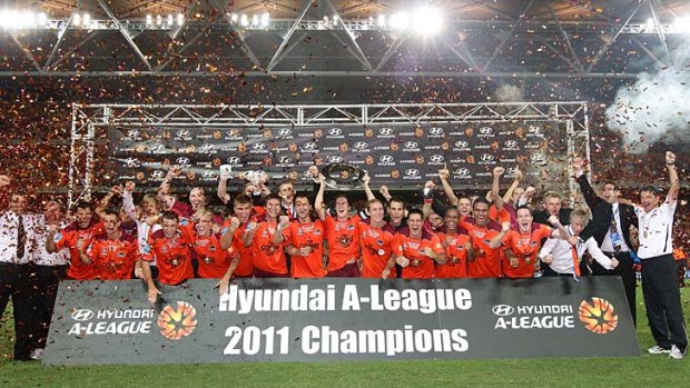 Best ever? ... Brisbane Roar celebrating their 2011 Hyundai A-League title earlier this year.