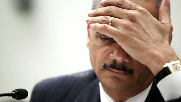 US Attorney General Eric Holder pauses as he testifies during a hearing before the House Judiciary Committee on oversight of the US Department of Justice May 15, 2013 on Capitol Hill in Washington, DC.
