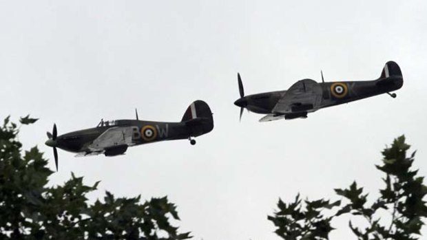 Many thanks to the Few... a Hurricane and Spitfire fly over London.