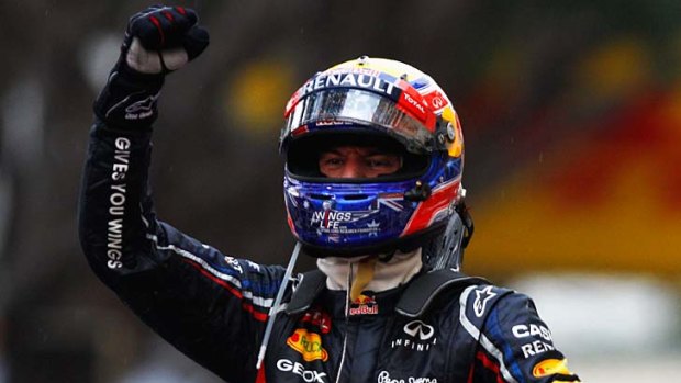 Victory ... Mark Webber celebrates.