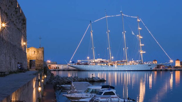 Masted glory: the Star Clipper at dusk.