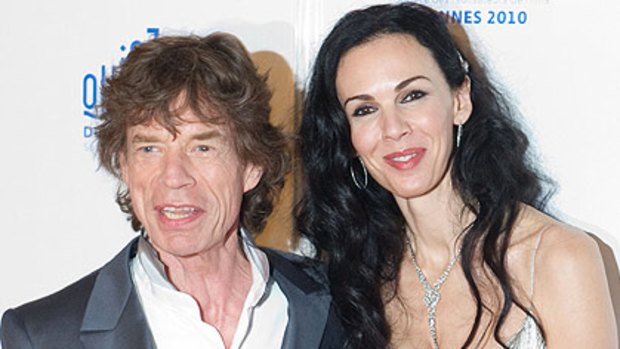 'We're still stupid'...Mick Jagger and US stylist Wren Scott arrive at the Cannes film festival overnight.