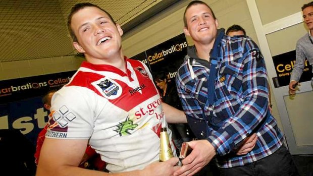Proposed reunion: Brett and Josh Morris after the Dragons' grand final win in 2010.
