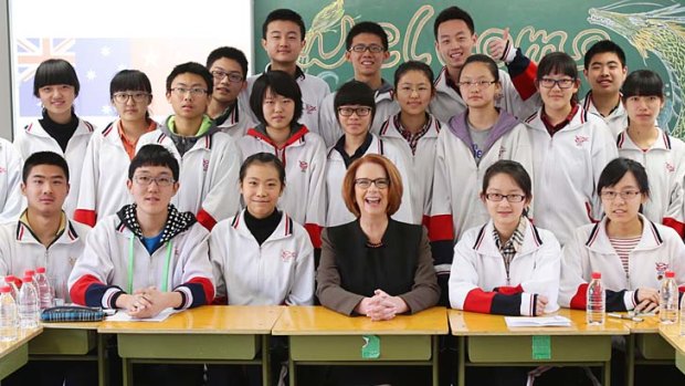 Class act: Julia Gillard visited year 11 students at Chenjinglun High School.