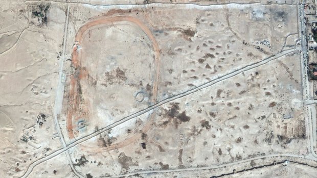 This October 26, 2014, satellite image provided by UNESCO shows levees and roads dug across the Northern Necropolis at Palmyra, Syria. IS fighters overran the historic town  in May 2015. 