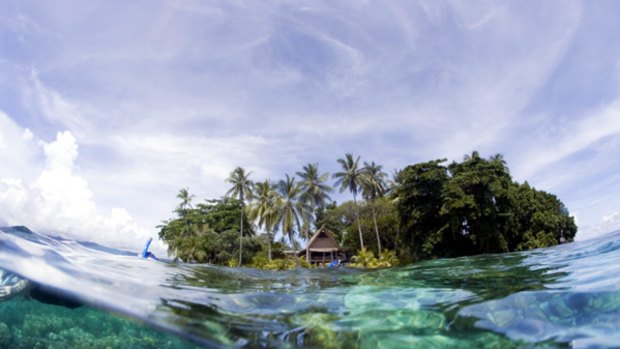 Water world ... a beach bungalow at Sanbis resort on Gizo Island.