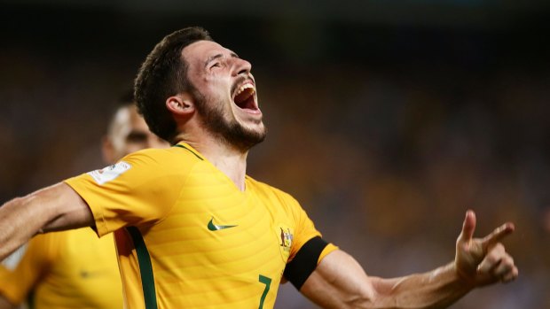 Beyond doubt: Mathew Leckie celebrates scoring the second goal for Austrlalia in Sydney on Tuesday night.