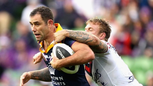 Hard to shift: Jake Friend attempts to stop incumbent Queensland hooker Cameron Smith.