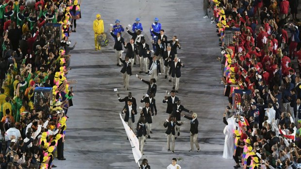 Rose Lokonyen Nathike carries the flag of the Refugee Olympic Team during the opening ceremony for the 2016 Summer Olympics in Rio de Janeiro.