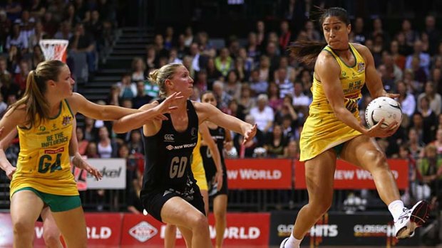 Mo'onia Gerrard of Australia keeps the ball in play during the match against New Zealand.