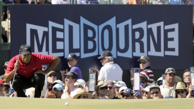 Tiger Woods lines up a putt at last year's Australian Masters.