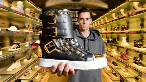 Made in Italy and yours for a mere $1868 a pair. Sneakerboy's Fletcher Adam with a Giuseppe Zanotti military print high top sneaker.
