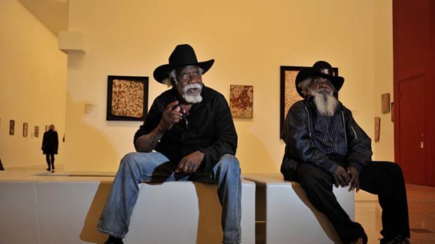 Papunya Tula Artists, Long Jack Phillipus Tjakamarra, left, and Ronnie Tjampitjinpa at the opening of the Tjukurrtjanu exhibition.