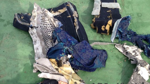 This picture posted Saturday, May 21, 2016, on the official Facebook page of the Egyptian Armed Forces spokesman shows part of a plane chair from EgyptAir flight 804. Search crews found floating human remains, luggage and seats from the doomed EgyptAir jetliner Friday but face a potentially more complex task in locating bigger pieces of wreckage and the black boxes vital to determining why the plane plunged into the Mediterranean. Arabic reads: ? Part of plane chair?.  (Egyptian Armed Forces via AP)