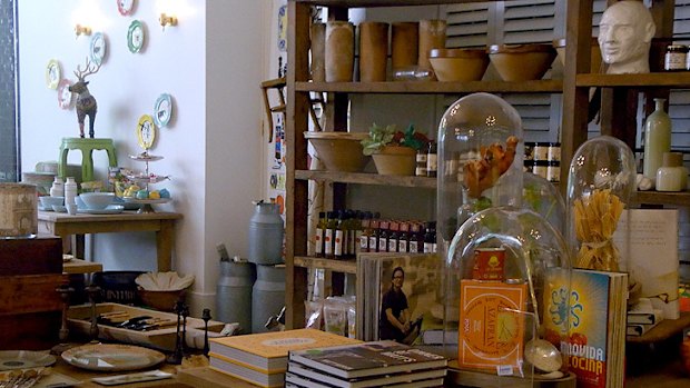 The current display of antique and new cookbooks and homewares at the Spring store.