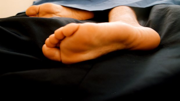 Keeping your feet uncovered can help your body cool down as you sleep.