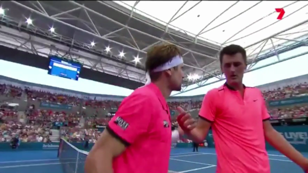 Round one winner David Ferrer asks Bernard Tomic: ' Are you OK? Are you sick?' after the Australian's exit.