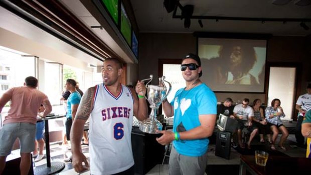 Ours for the keeping . . . Frank Pritchard and Ben Matulino celebrate New Zealand's Four Nations success at a Brisbane hotel yesterday.