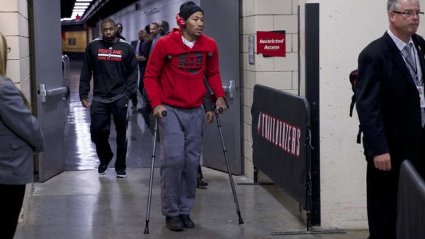 Chicago Bulls point guard Derrick Rose leaves the Moda Center on crutches after he was injured in a game against the Portland Trail Blazers.