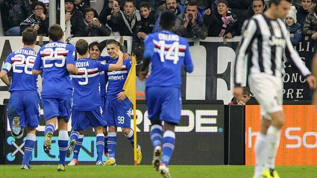 Sampdoria's Mauro Emanuel Icardi celebrates with teammates after scoring against Juventus.