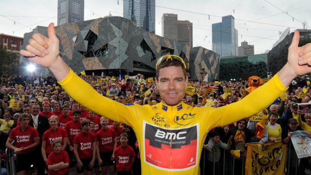 Cadel Evans basks in the adulation during his victory parade in Melbourne last year.
