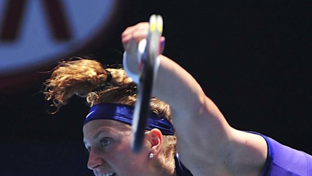 Hitting the heights: Petra Kvitova rifles down a serve in her quarter-final.