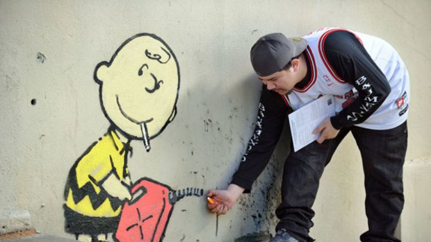 <i>Charlie Brown Firestarter</i> has been attributed to graffiti master Banksy.