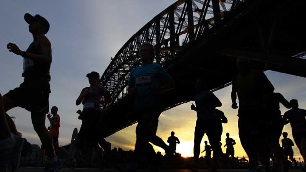 Nice and breezy does it: Runners in the <i>Sydney Morning Herald</i> Half Marathon make their way along Hickson Road.
