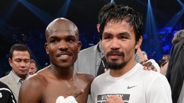 Timothy Bradley and Manny Pacquiao pose for a photo after Bradley defeated Pacquiao by split decision.