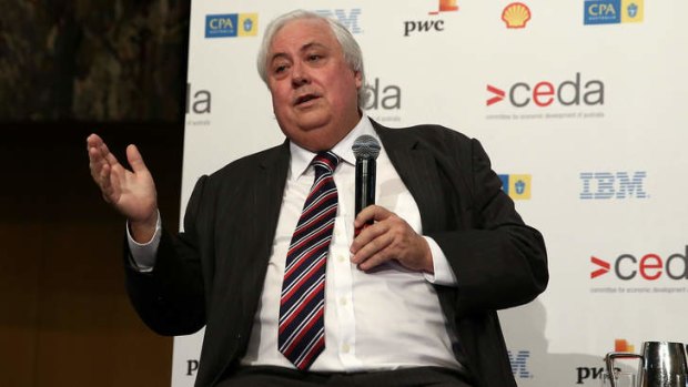 Political business: Clive Palmer addresses a conference on Monday.