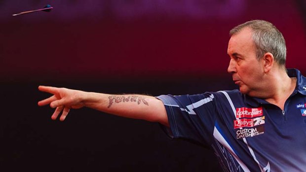 Steady as she goes: Phil Taylor.