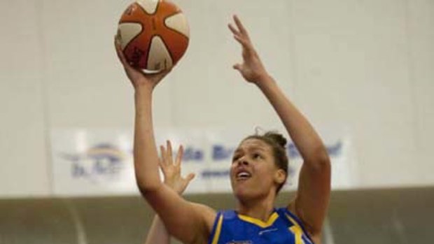 Bulleen's Liz Cambage goes for the basket against Sydney University.