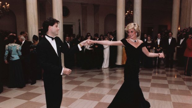 Diana, Princess of Wales, dances with John Travolta at the White House in 1985 wearing a gown by Victor Edelstein. “In fashion terms, that dress proved to be the turning point for Diana,” Anna Harvey later revealed.