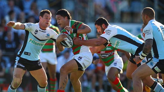 Issac Luke of the Rabbitohs tries to break through the Cronulla defence.