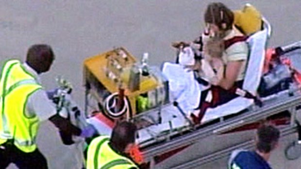 Tragedy . . . Susan Higgins  arrives at Westmead with her children.