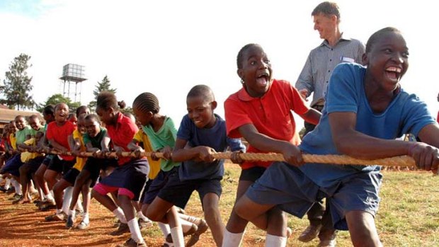 Teamwork &#8230; Mike Flynn with children from the program. Kenya has officially banned corporal punishment, yet the UN Refugee Agency says bruises and cuts are routine and broken bones are not uncommon.