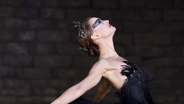 Actor Natalie Portman performs as a ballet dancer in Black Swan.
