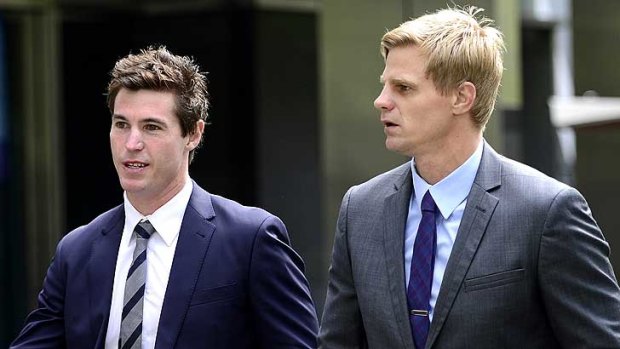 St Kilda football players Lenny Hayes (retired) and Nick Reiwoldt arrive at the County Court on Thursday as their friend and former teammate Stephen Milne pleads guilty to indecent assault.